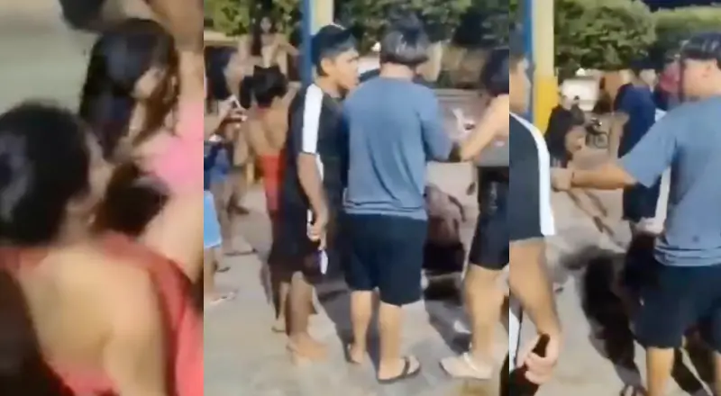 mulheres rolam no chão e disputam quem vai ficar com o "Presente de Deus" em Maués